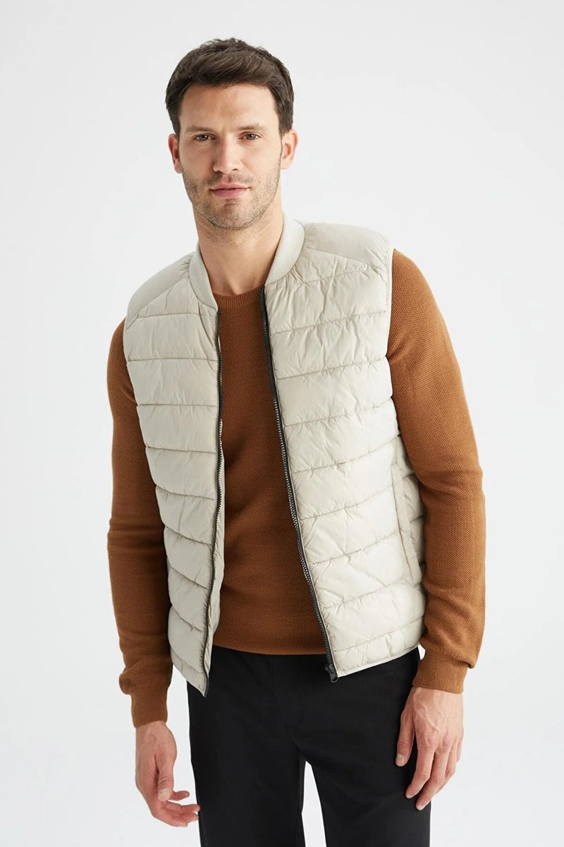 https://www.trendyol.com/en/defacto/vest-beige-puffer-p-333579306?boutiqueId=624570&merchantId=1188