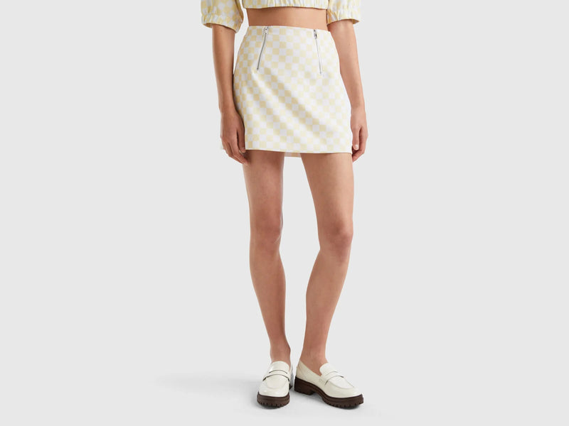 https://nl.benetton.com/checkered-mini-skirt-yellow-4ZNFD001O_66P.html