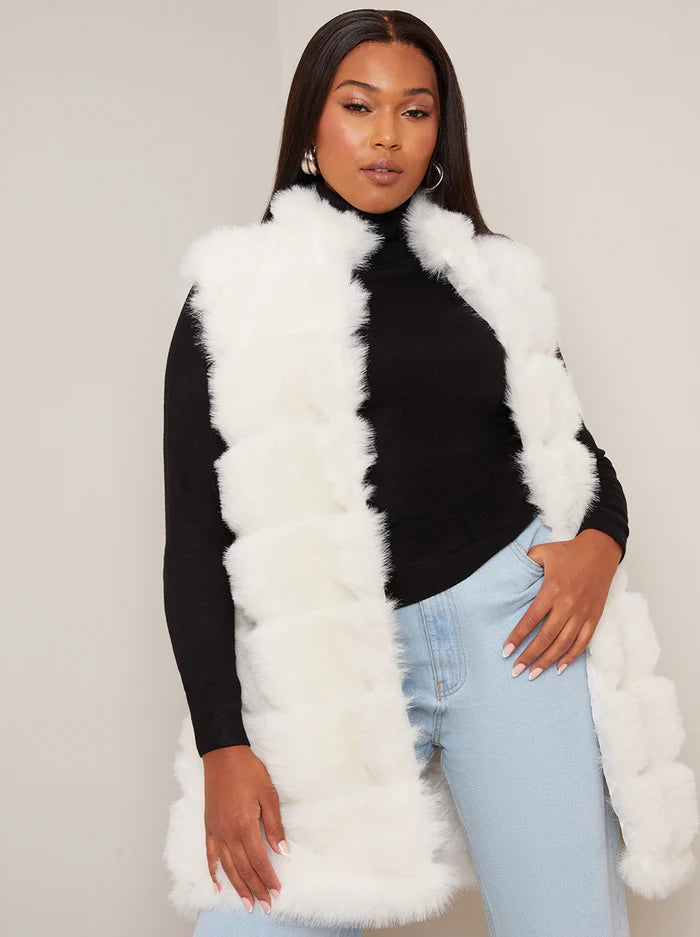 https://www.chichiclothing.com/products/faux-fur-stripe-calved-gilet-in-cream