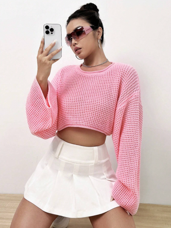 https://nl.shein.com/Solid-Drop-Shoulder-Crop-Sweater-p-22920285-cat-1734.html?src_identifier=fc%3DWomen%60sc%3DKleding%60tc%3DKNITWEAR%60oc%3DSweaters%60ps%3Dtab01navbar04menu05dir01%60jc%3Dreal_1734&src_module=topcat&src_tab_page_id=page_home1698586826213&mallCode=1&imgRatio=3-4