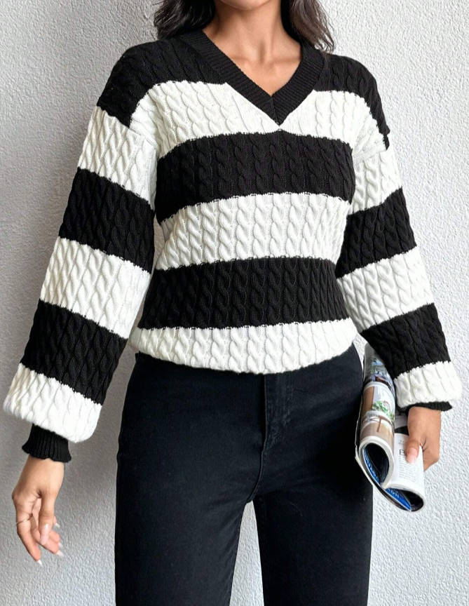 https://nl.shein.com/SHEIN-Two-Tone-Cable-Knit-Drop-Shoulder-Sweater-p-21568208-cat-1734.html?src_identifier=fc%3DWomen%60sc%3DKleding%60tc%3DKNITWEAR%60oc%3DSweaters%60ps%3Dtab01navbar04menu05dir01%60jc%3Dreal_1734&src_module=topcat&src_tab_page_id=page_home1698586826213&mallCode=1&imgRatio=3-4