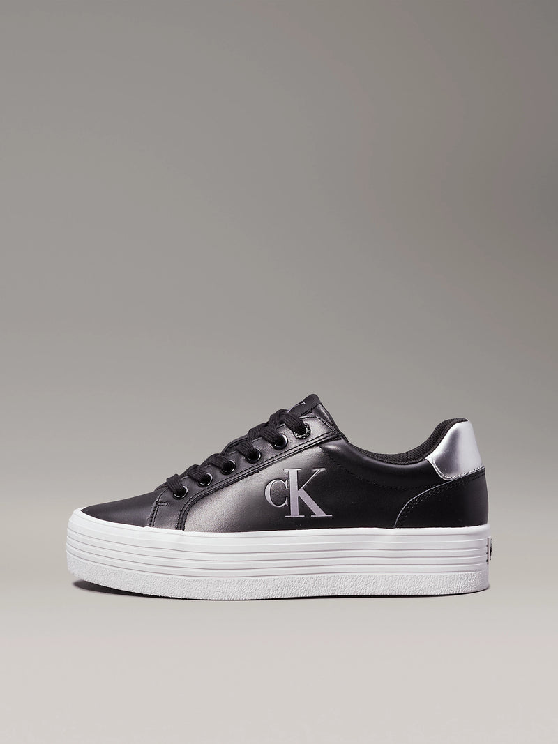 https://www.calvinklein.nl/leren-plateausneakers-yw0yw016880gq