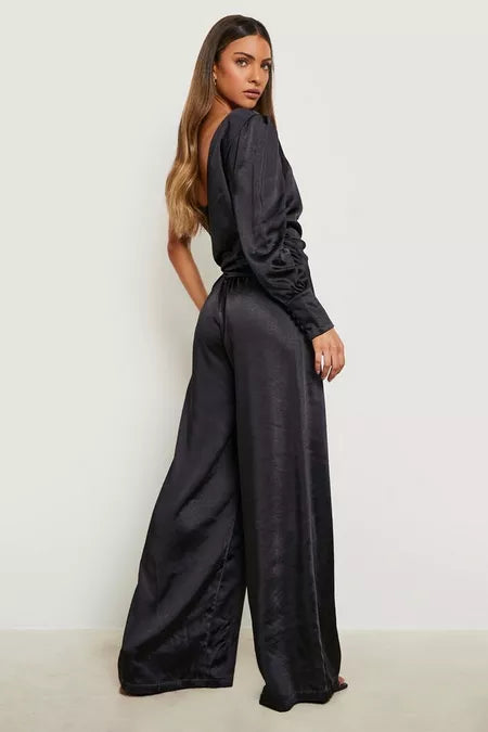 Dames jumpsuit satijn groen zwart s m