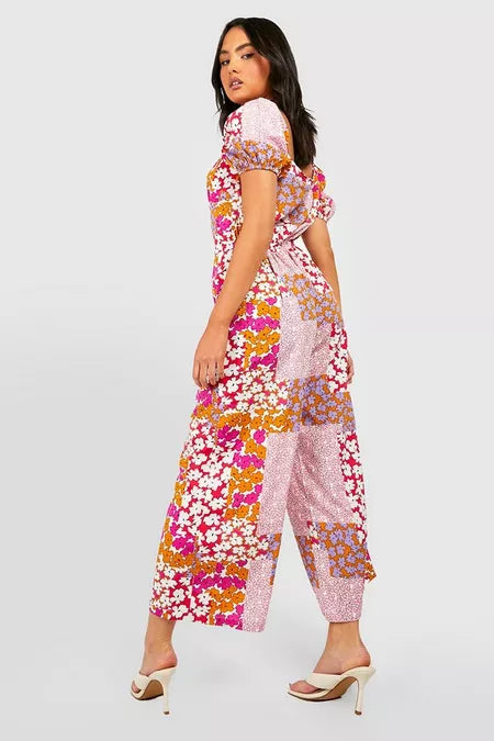 Dames jumpsuit bloemenprint roze s