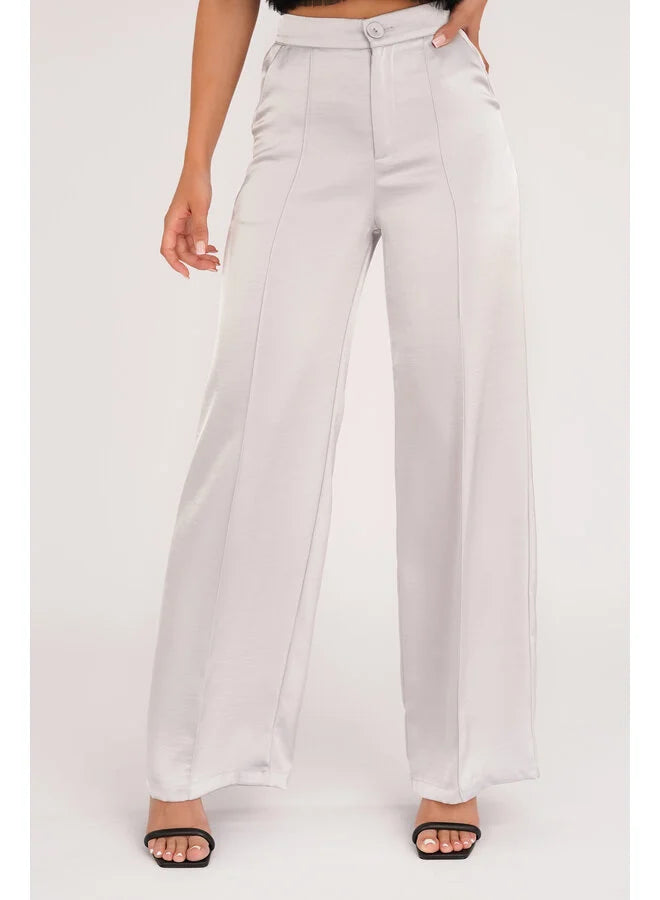 https://www.esuals.nl/wide-leg-pantalon-satin-grijs-carli.html