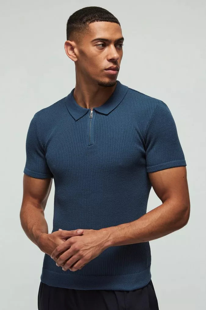 https://nl.boohoo.com/geribbelde-gebreide-muscle-fit-polo-met-hals-rits/CMM01406.html