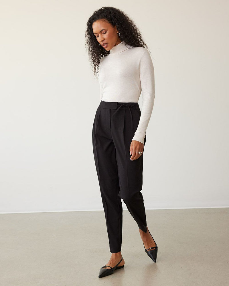 https://www.reitmans.com/en/tapered-leg-high-rise-pants-with-tie-detail-at-waist/470515.html?dwvar_470515_color=Black