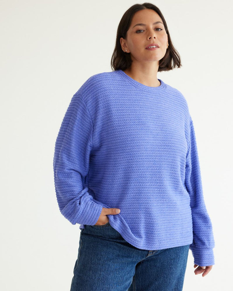 https://www.reitmans.com/en/long-sleeve-crew-neck-tee-with-cable-stitches/472243.html?dwvar_472243_color=Snow%20White&cgid=Women_Tees_And_Knits