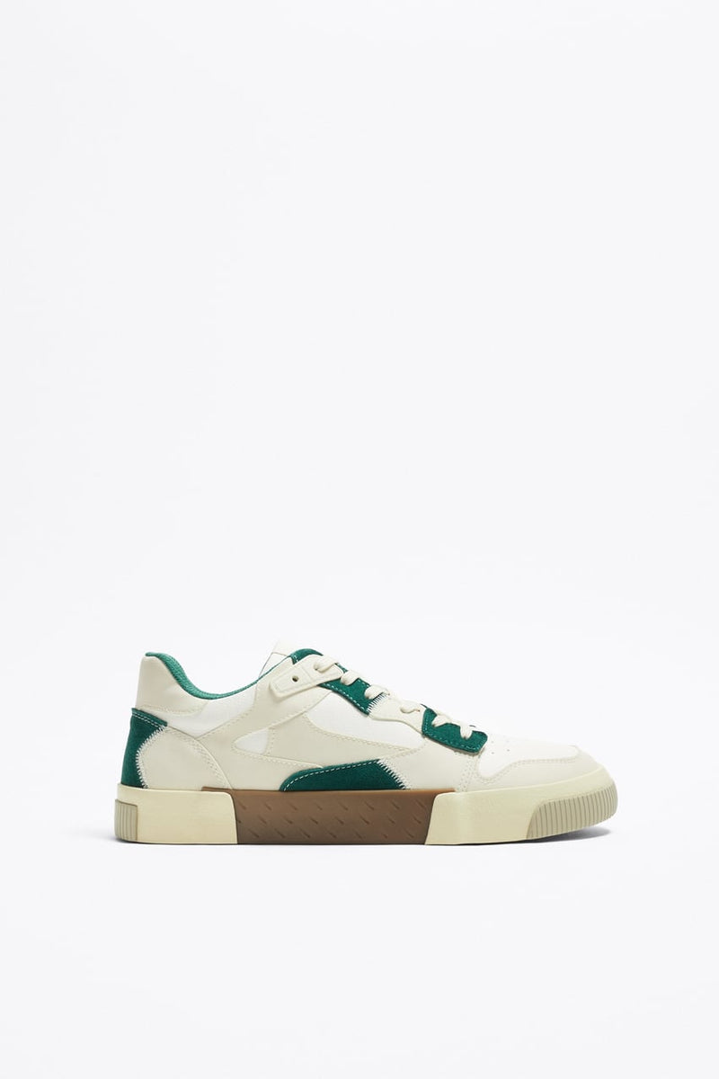 https://www.zara.com/nl/nl/sneakers-met-verschillende-stukken-p12204120.html?v1=222766531&v2=2203869