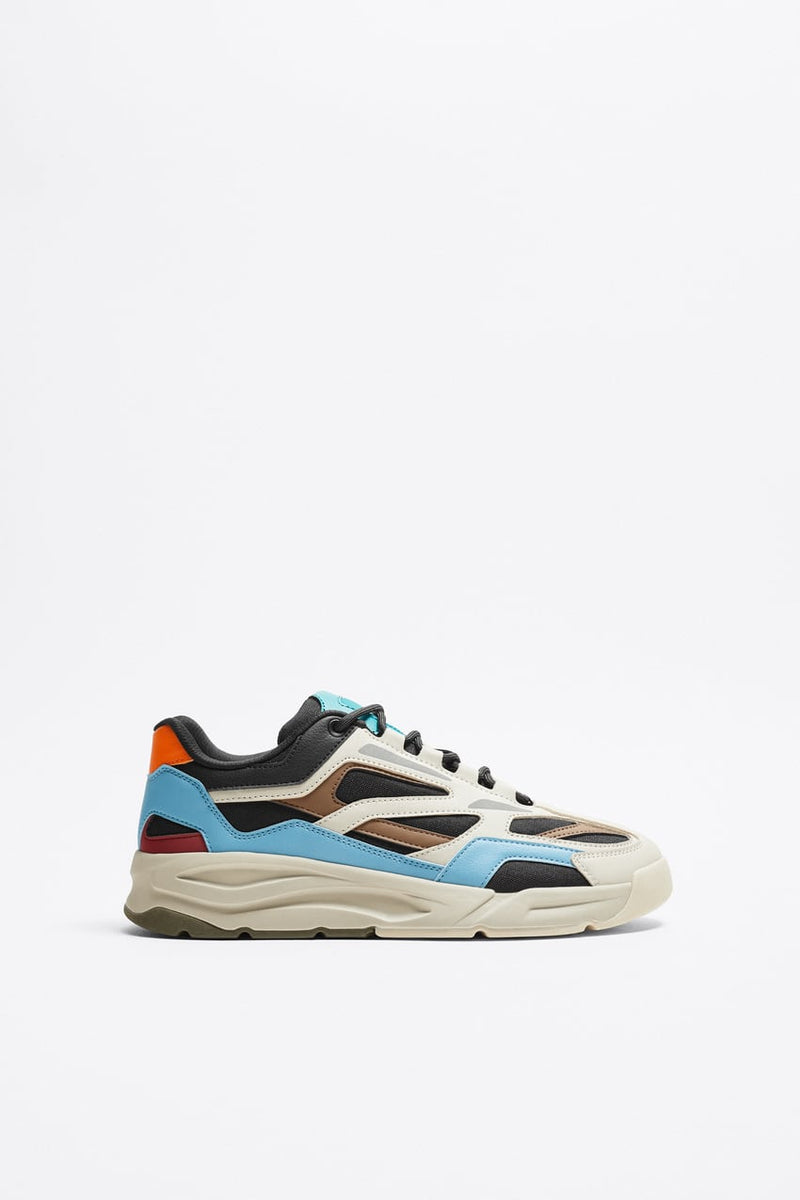 https://www.zara.com/nl/nl/sneakers-met-verschillende-stukken-p12302120.html?v1=223562549&v2=2203869